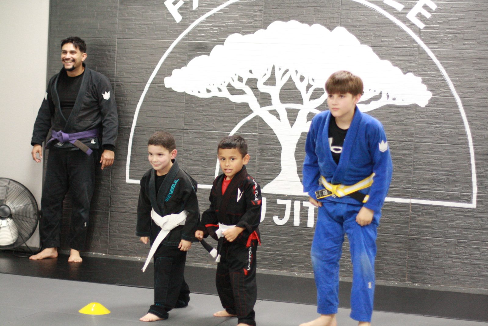 Members drilling on the mats at Family Tree