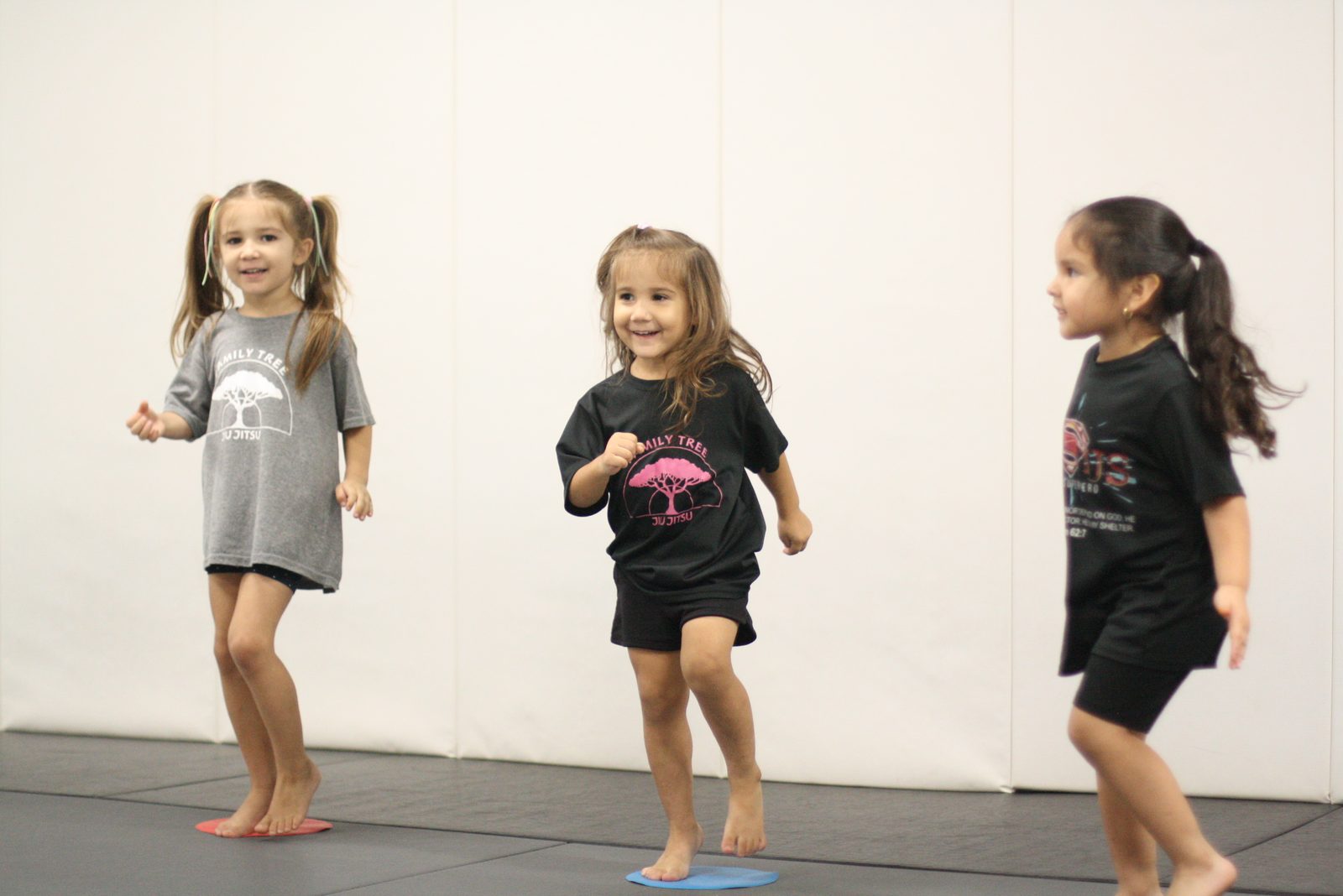 Coach guiding students through a drill