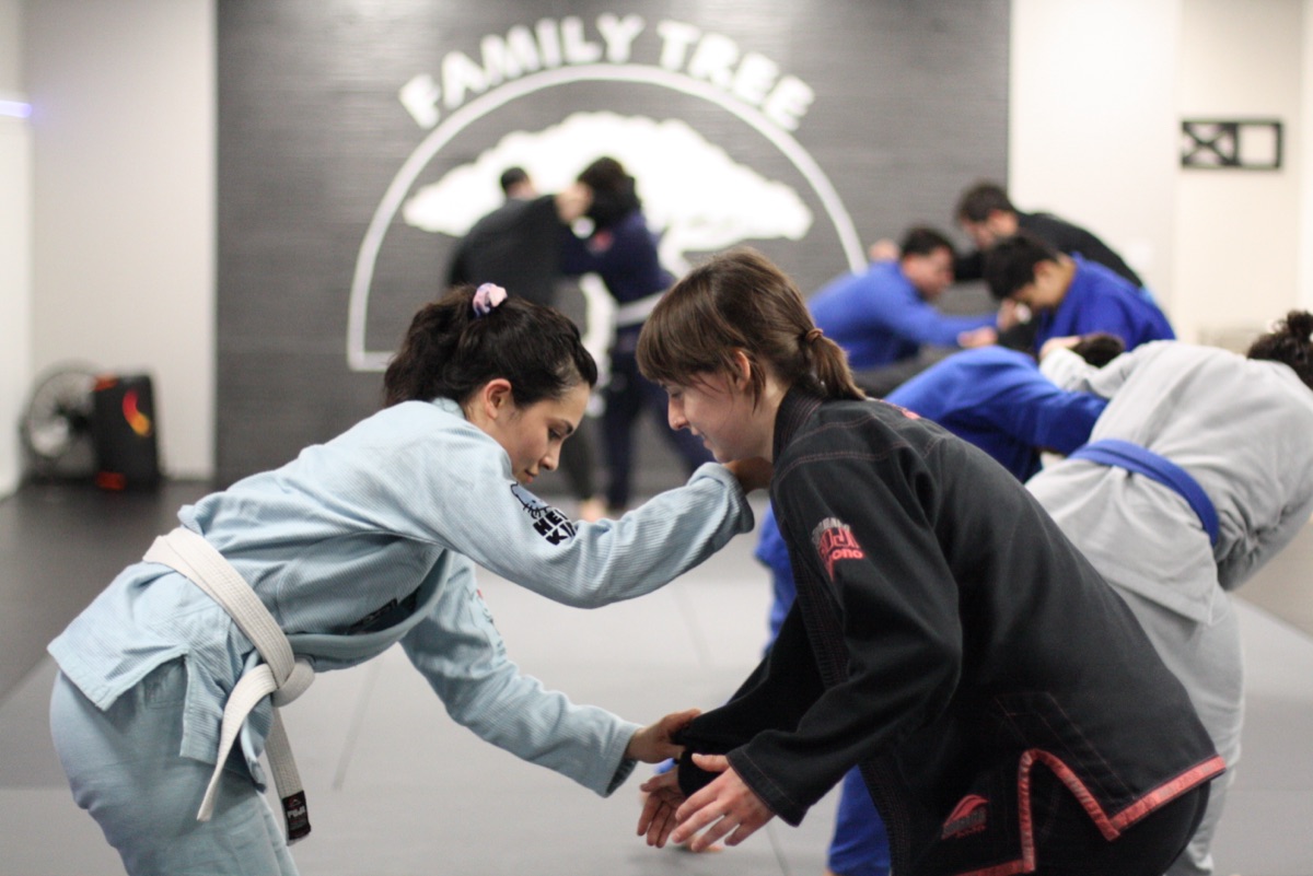 Two women training Jiu Jitsu together at Family Tree